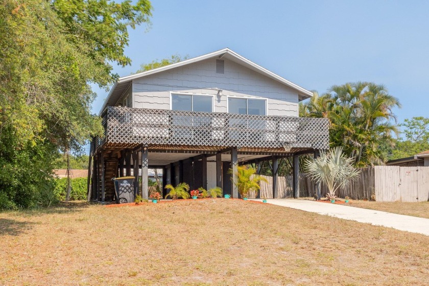 Own a truly unique home in Palm Bay today with a BRAND-NEW ROOF - Beach Home for sale in Palm Bay, Florida on Beachhouse.com