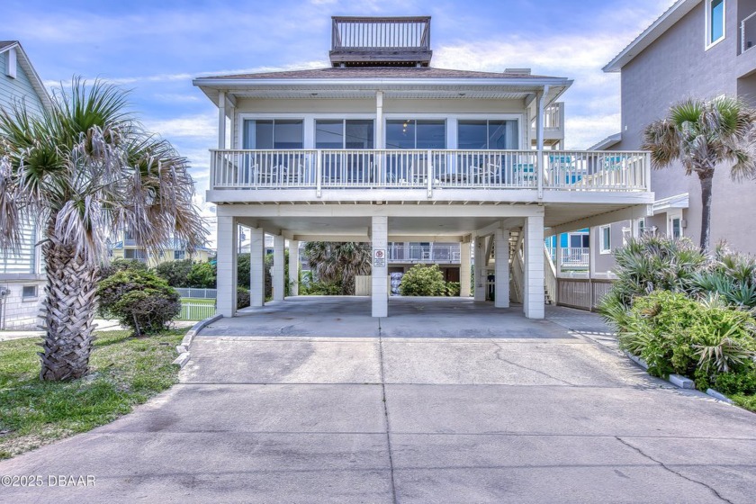 This beautifully maintained beachside home offers the perfect - Beach Home for sale in New Smyrna Beach, Florida on Beachhouse.com