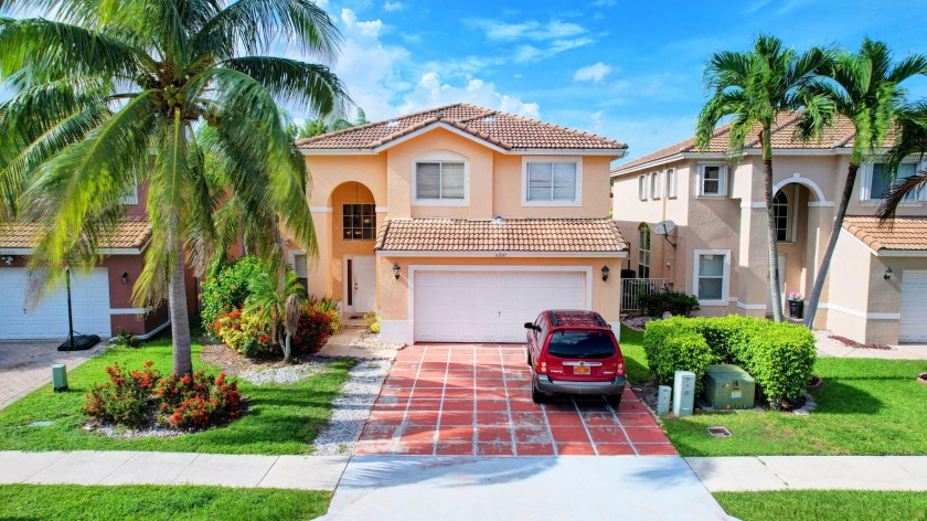 This stunning 3-bedroom, 2.5-bathroom single-family home is - Beach Home for sale in Lake Worth, Florida on Beachhouse.com