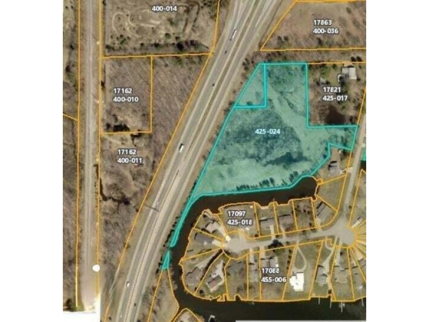 Private 6.1 acreage on 850'+ of SPRING LAKE-Smith's Bayou WATER - Beach Acreage for sale in Ferrysburg, Michigan on Beachhouse.com