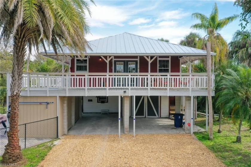 Introducing a distinguished waterfront retreat! Currently a - Beach Home for sale in North Fort Myers, Florida on Beachhouse.com