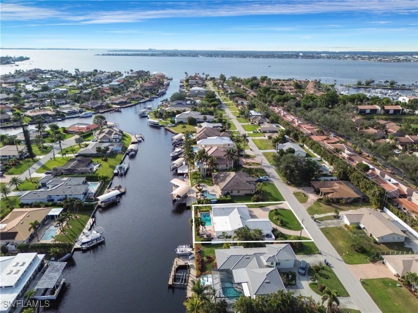 This Town and River, direct access home is located on one of the - Beach Home for sale in Fort Myers, Florida on Beachhouse.com