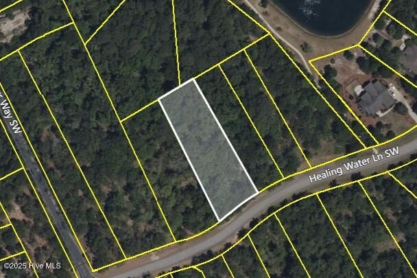 Welcome to this spacious homesite (.73 acres!) nestled in the - Beach Lot for sale in Supply, North Carolina on Beachhouse.com