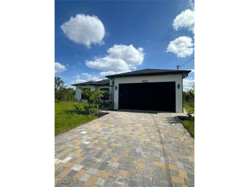 BRAND NEW CONSTRUCTION ON A CANAL LOT! You Will Be Amazed By The - Beach Home for sale in Lehigh Acres, Florida on Beachhouse.com