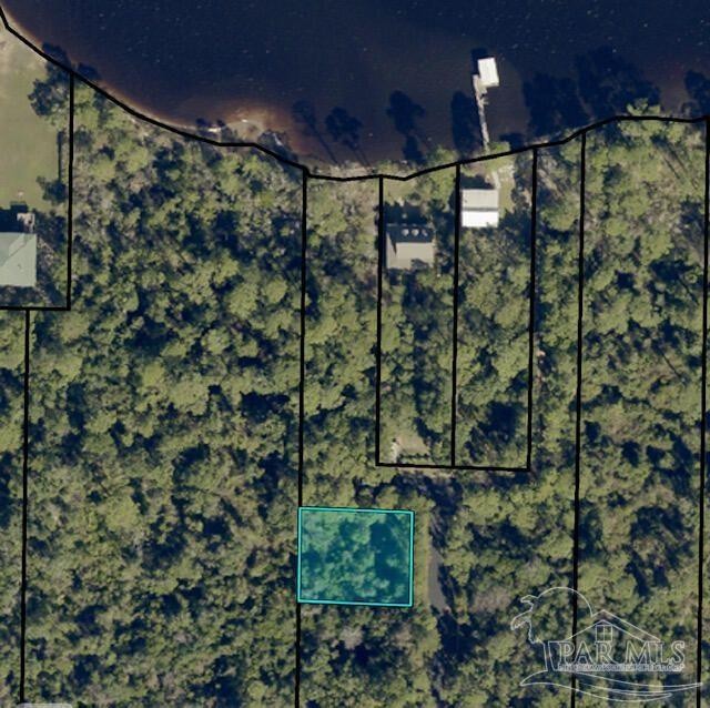 This awesome 1/4 acre vacant lot with views of the Bay is ready - Beach Lot for sale in Navarre, Florida on Beachhouse.com