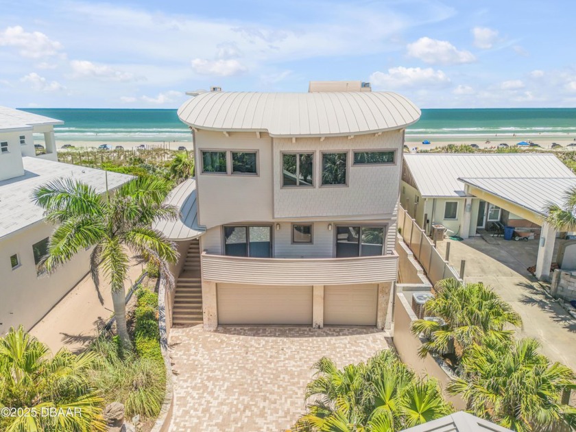 Emerge into a realm where the serene symphony of ocean waves and - Beach Home for sale in New Smyrna Beach, Florida on Beachhouse.com
