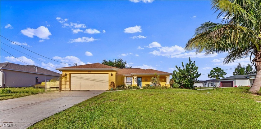 Welcome to this nicely updated 3/2 nestled away on the CORNER of - Beach Home for sale in Lehigh Acres, Florida on Beachhouse.com