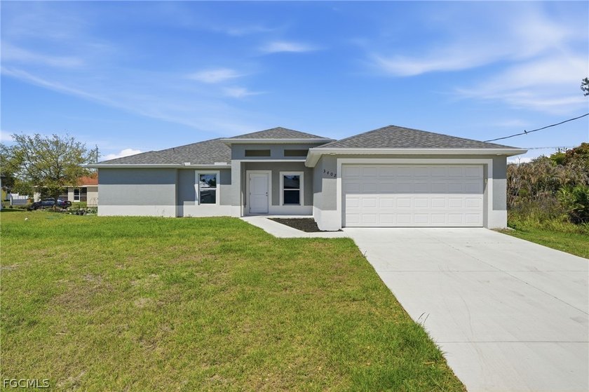 Discover this beautiful 4-bedroom, 2-bath home situated on an - Beach Home for sale in Lehigh Acres, Florida on Beachhouse.com