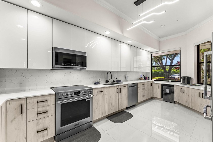 Impeccably reimagined and filled with natural light, this - Beach Condo for sale in Boca Raton, Florida on Beachhouse.com