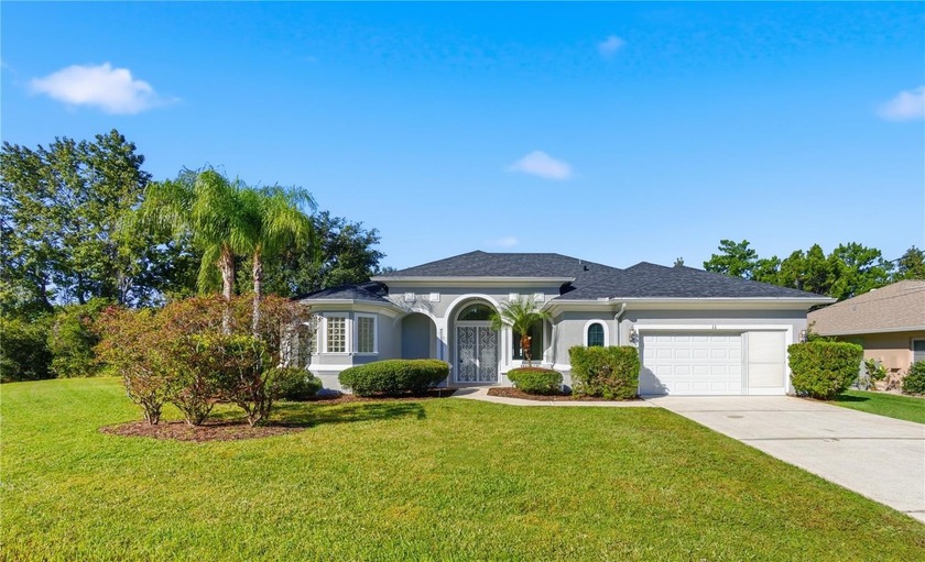 Stunning Custom Pool Home in Desirable Pine Lakes! Welcome to - Beach Home for sale in Palm Coast, Florida on Beachhouse.com