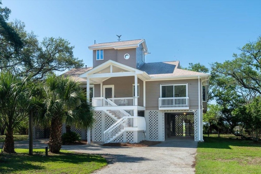 Nestled amongst the live oaks of Edisto Island, this impressive - Beach Home for sale in Edisto Island, South Carolina on Beachhouse.com