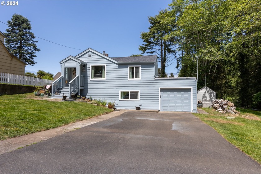 This beautifully updated 1915 home is a true gem that seamlessly - Beach Home for sale in Lincoln City, Oregon on Beachhouse.com