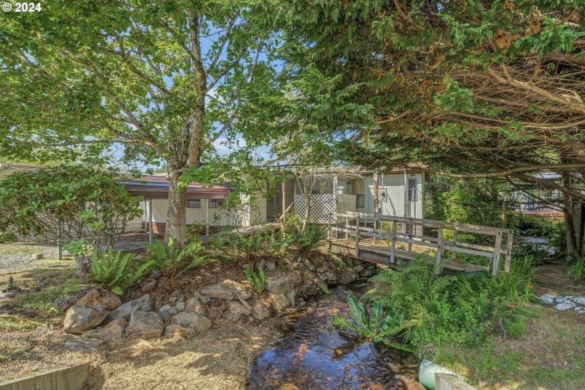 Just nine blocks from seven miles of sandy beach, this coastal - Beach Home for sale in Rockaway Beach, Oregon on Beachhouse.com