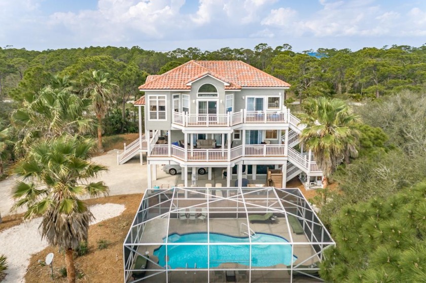 Enjoy your on Resort in this FURNISHED  Mediterranean style home - Beach Home for sale in St. George Island, Florida on Beachhouse.com