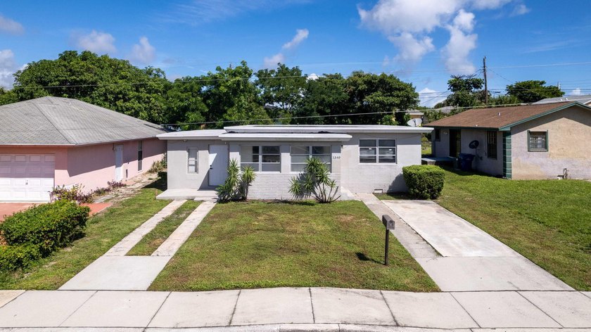 Turnkey duplex in sought-after Riviera Beach! Featuring a 3/1 - Beach Home for sale in Riviera Beach, Florida on Beachhouse.com