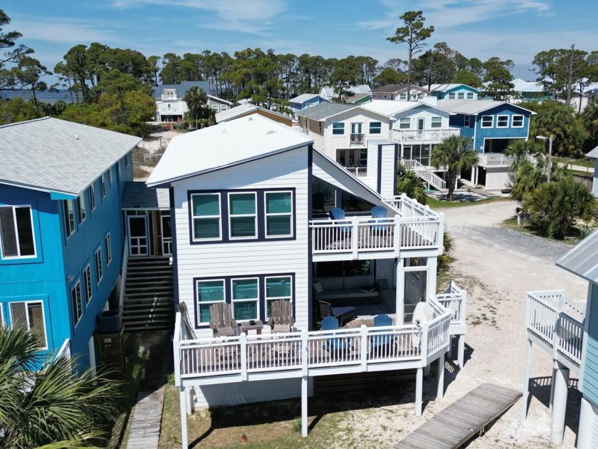 Kick back on your back porch or 2nd level open deck and relax - Beach Home for sale in Cape San Blas, Florida on Beachhouse.com
