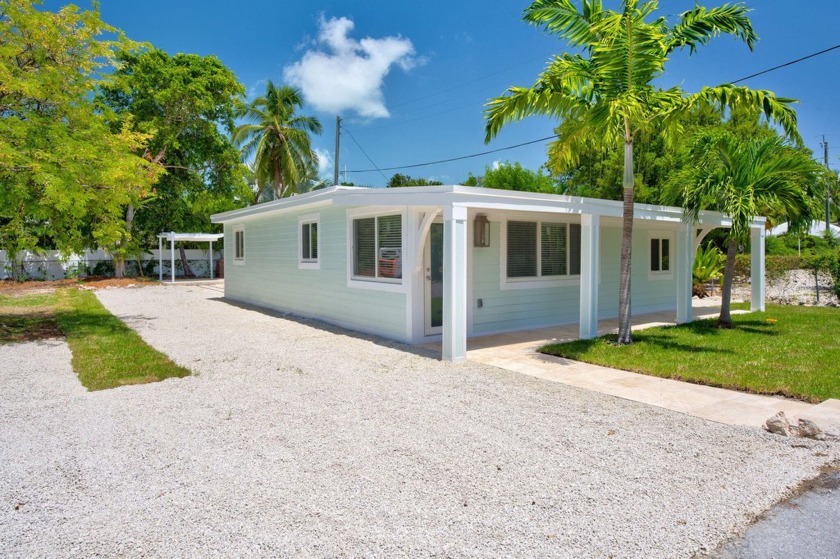 OPPORTUNITIES ARE ENDLESS! TWO lots and TWO units sitting on a - Beach Home for sale in Key Largo, Florida on Beachhouse.com
