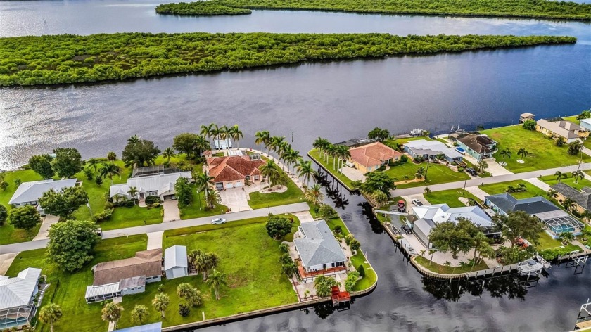 This one-of-a-kind 3-bedroom, 3-bathroom waterfront home in the - Beach Home for sale in Punta Gorda, Florida on Beachhouse.com