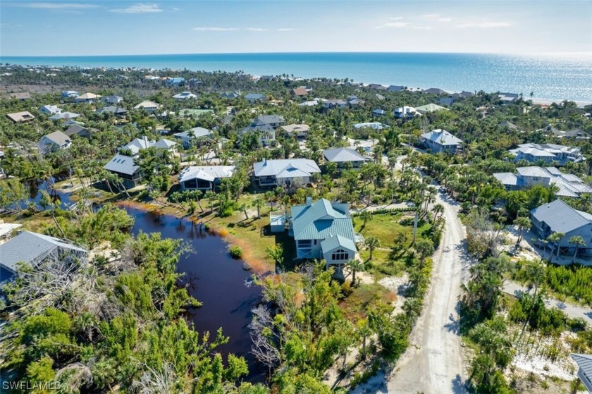 Elevate your lifestyle with this exquisite coastal sanctuary - Beach Home for sale in Sanibel, Florida on Beachhouse.com