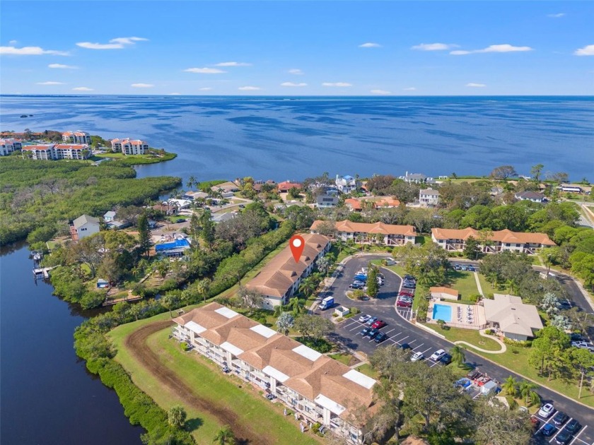 This meticulously maintained 2nd-floor condo with canal views in - Beach Condo for sale in Tarpon Springs, Florida on Beachhouse.com