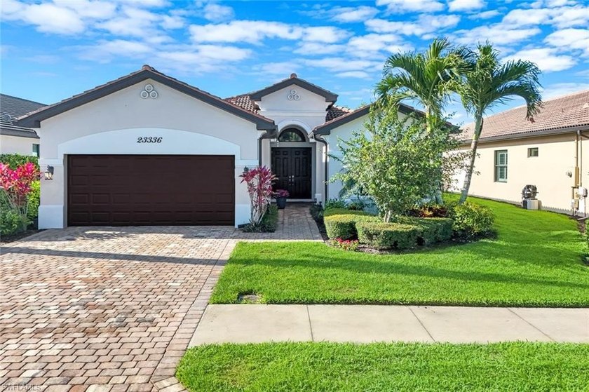Welcome to 23336 Sanabria Loop, set within the gates of Bonita - Beach Home for sale in Bonita Springs, Florida on Beachhouse.com
