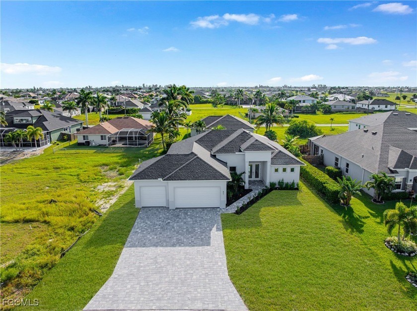 Welcome to this stunning 3-bedroom + den, 3-bathroom pool home - Beach Home for sale in Cape Coral, Florida on Beachhouse.com