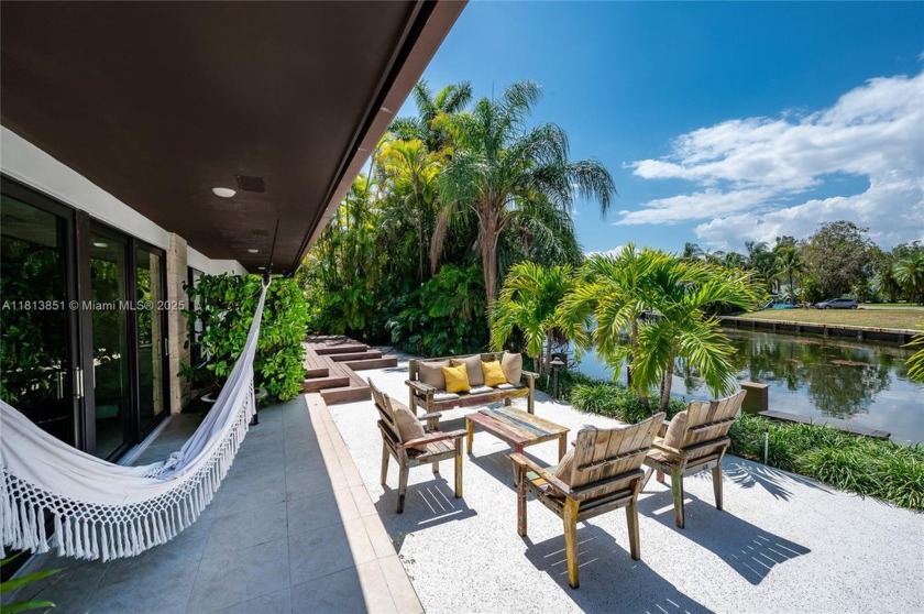 This stunning modern home boasts an incredible view of the canal - Beach Home for sale in Coral Gables, Florida on Beachhouse.com