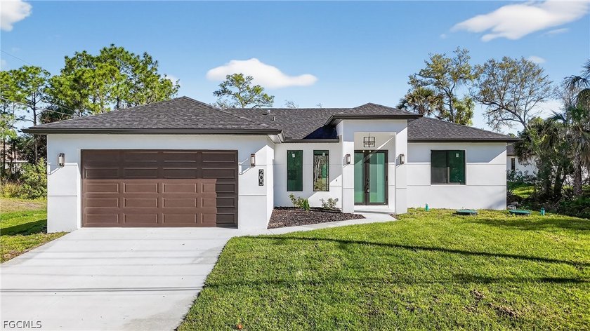 OUTDOOR KITCHEN AND COVERED LANAI | CENTRAL LOCATION | NO HOA | - Beach Home for sale in Lehigh Acres, Florida on Beachhouse.com