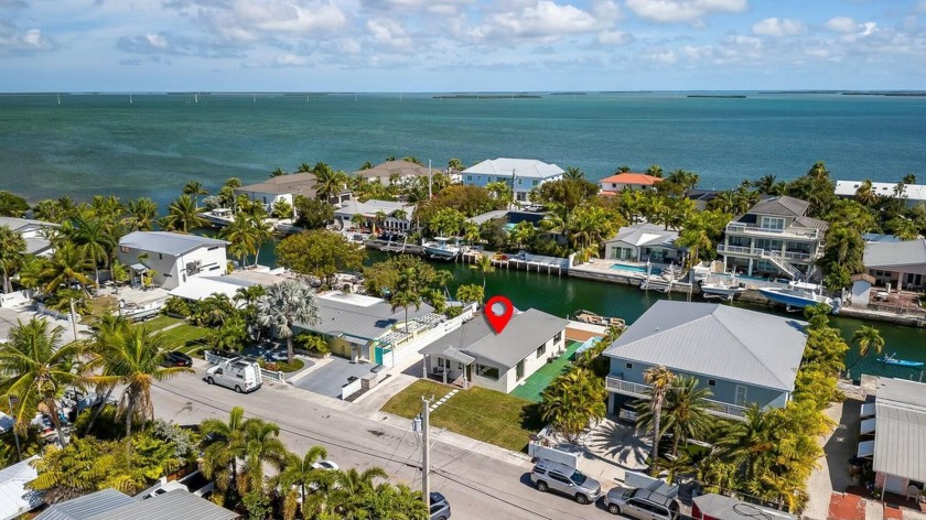 This fully upgraded 2 bedroom 1 bathroom canal front home offers - Beach Home for sale in Key Haven, Florida on Beachhouse.com