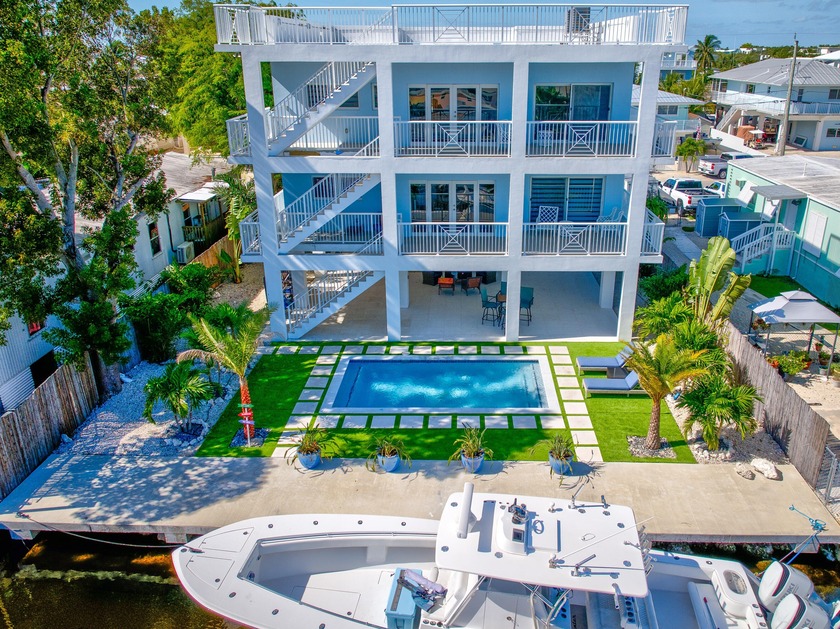 Experience the pinnacle of coastal luxury in this brand-new - Beach Home for sale in Key Largo, Florida on Beachhouse.com