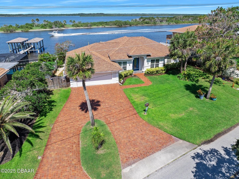 Celebrate sunsets nightly from the expansive riverfront, paver - Beach Home for sale in Ormond Beach, Florida on Beachhouse.com