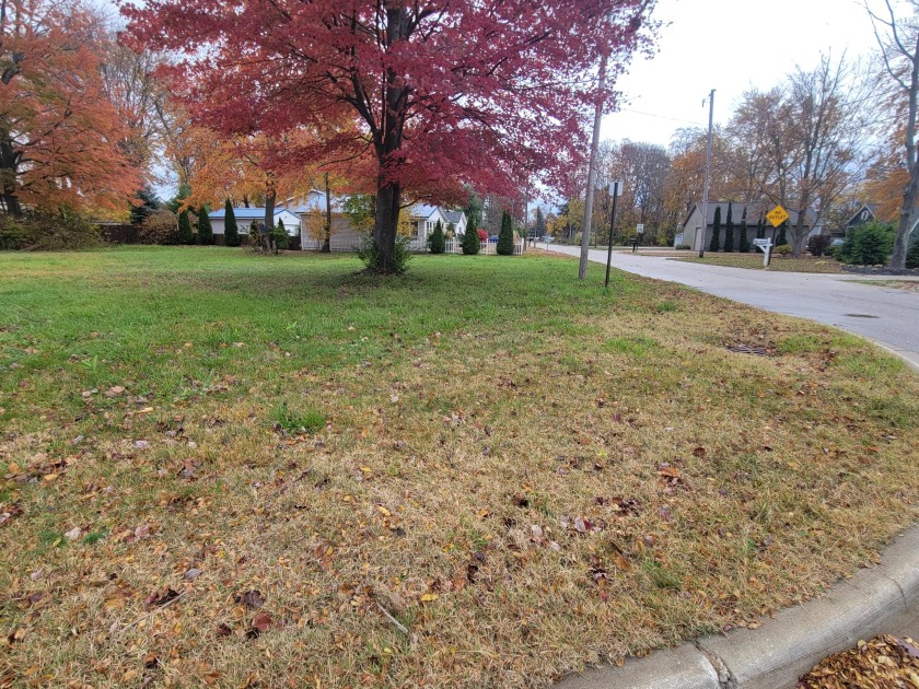 Here is a vacant lot with a good view of Mona Lake and Mona Lake - Beach Lot for sale in Norton Shores, Michigan on Beachhouse.com