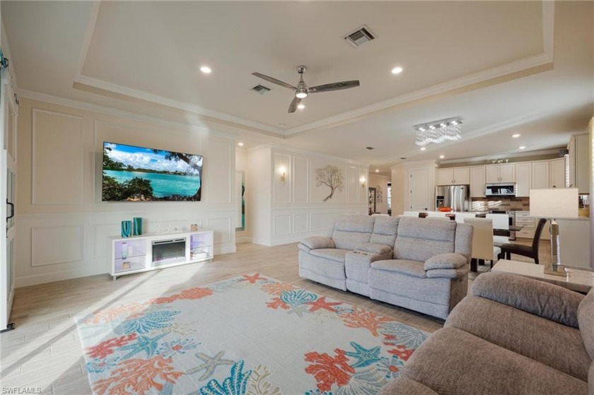 Enjoy beautiful sunsets over a large lake view in this stunning - Beach Home for sale in Estero, Florida on Beachhouse.com