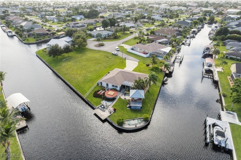 Waterfront Paradise with 240' of Intersecting Canal Frontage - Beach Home for sale in Cape Coral, Florida on Beachhouse.com