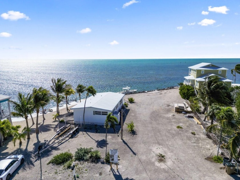 RARE double ocean front lot featuring 120 ft seawall with - Beach Home for sale in Geiger Key, Florida on Beachhouse.com