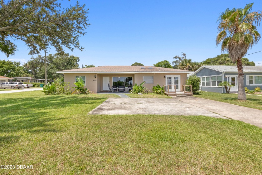 Welcome to your water view oasis! This 3-bedroom, 2-bath home - Beach Home for sale in Holly Hill, Florida on Beachhouse.com
