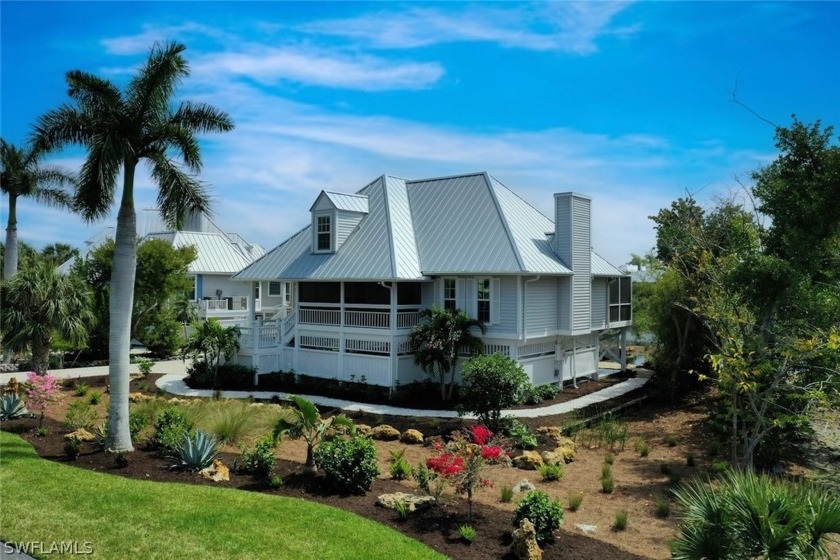 This tastefully outfitted & beautifully remodeled home - Beach Home for sale in Sanibel, Florida on Beachhouse.com