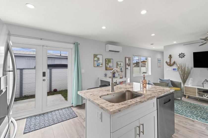 Discover this beautifully updated 3-bedroom, 3-bathroom home in - Beach Home for sale in Stock Island, Florida on Beachhouse.com