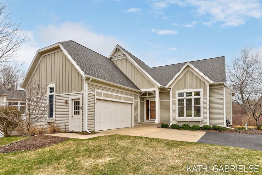 Welcome to the Cottages at Wildwood Springs! This beautifully - Beach Condo for sale in Spring Lake, Michigan on Beachhouse.com