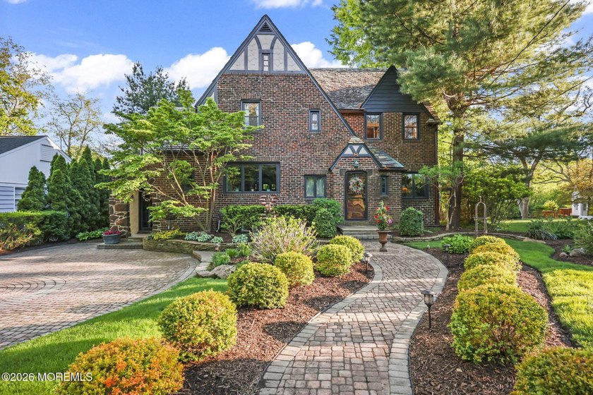 Set on one of Interlaken's most desirable streets, this charming - Beach Home for sale in Interlaken, New Jersey on Beachhouse.com
