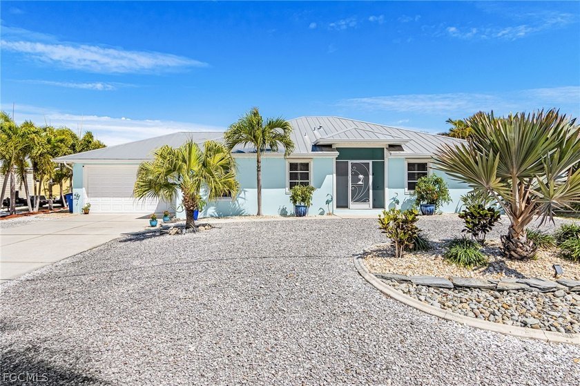 This beautifully furnished home offers 2 bedrooms PLUS a Bonus - Beach Home for sale in St. James City, Florida on Beachhouse.com