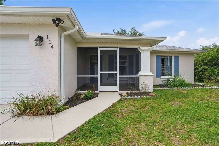 Welcome to 134 McArthur Blvd, a move-in ready home offering - Beach Home for sale in Lehigh Acres, Florida on Beachhouse.com