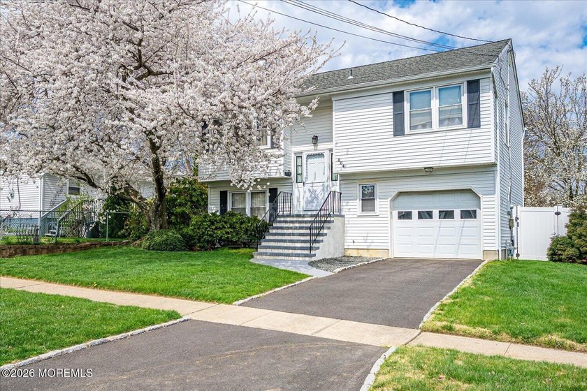 Get ready to fall in love! This spacious Bi-level home has tons - Beach Home for sale in Cliffwood, New Jersey on Beachhouse.com
