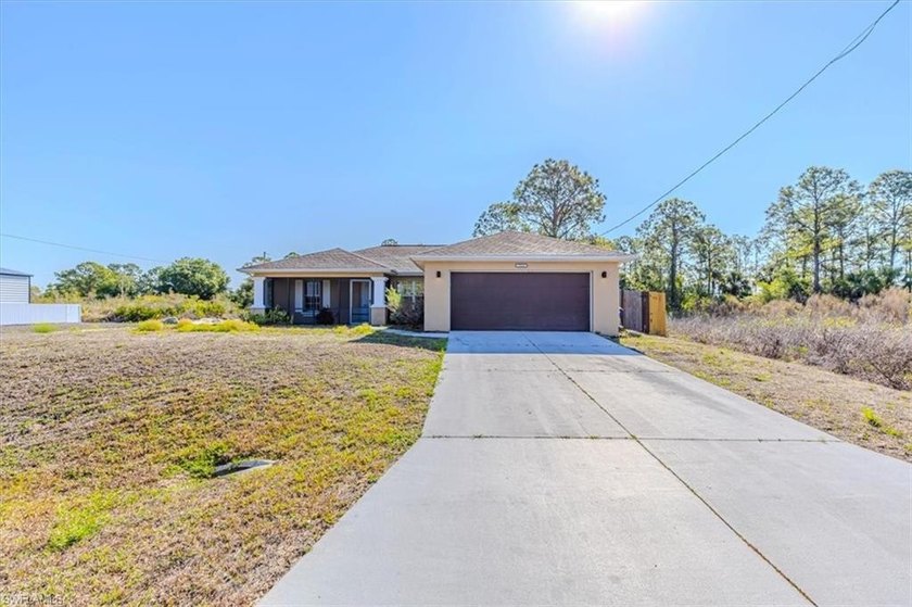 Situated on an oversized corner lot on a quiet dead-end street - Beach Home for sale in Lehigh Acres, Florida on Beachhouse.com