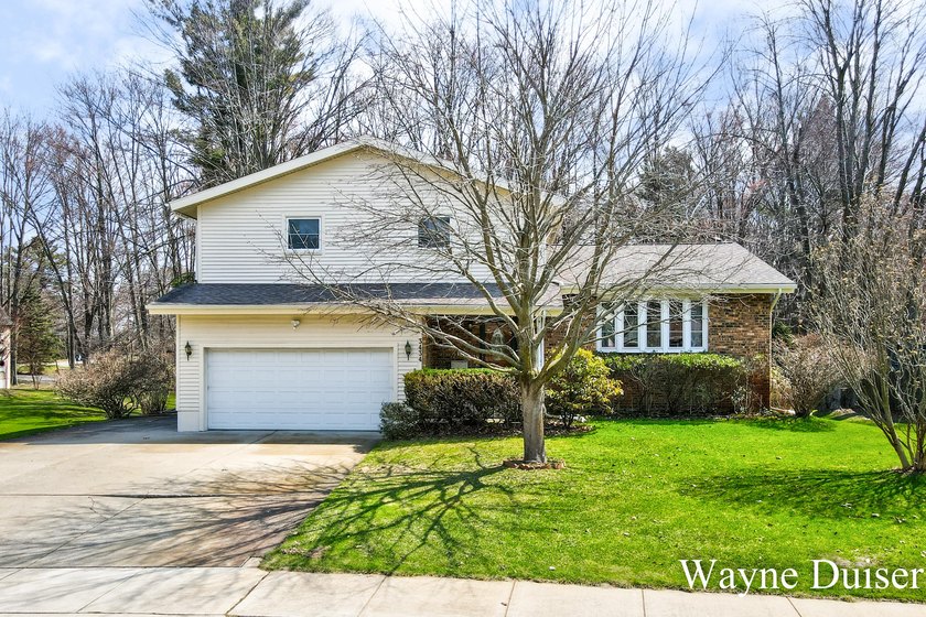 This is a great 4 bedroom/2.5 bath home in Norton Shores near - Beach Home for sale in Muskegon, Michigan on Beachhouse.com