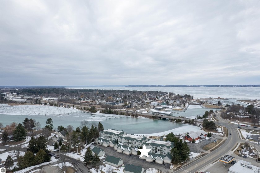 Fabulous Elk River waterfront condo living with beautifully - Beach Condo for sale in Elk Rapids, Michigan on Beachhouse.com