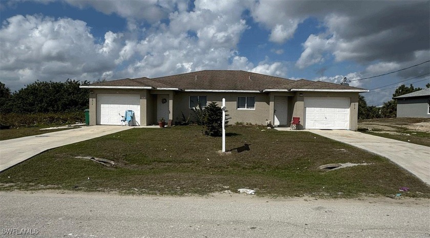 LOCATION LOCATION! This duplex features 3 bedrooms/2 baths, one - Beach Home for sale in Lehigh Acres, Florida on Beachhouse.com