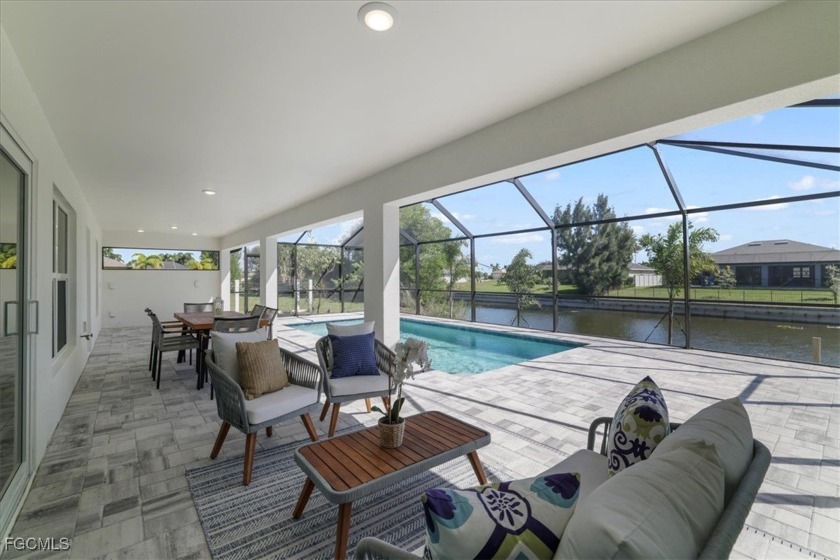 WATERFRONT PARADISE ON CITY WATER/SEWER WITH DUAL PRIMARY SUITES - Beach Home for sale in Cape Coral, Florida on Beachhouse.com