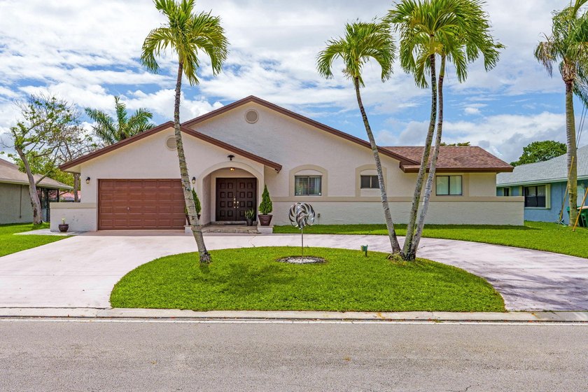 Beautifully updated 3-bedroom, 2-bath single-family home in a - Beach Home for sale in Tamarac, Florida on Beachhouse.com