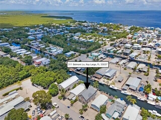 Amazing Three-Story Waterfront Haven in Cross Key Waterways, KEY - Beach Home for sale in Key Largo, Florida on Beachhouse.com